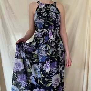 Gorgeous sleeveless long length floral dress.